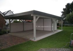 Flachdachcarport mit Schindelblende und Abstellraum